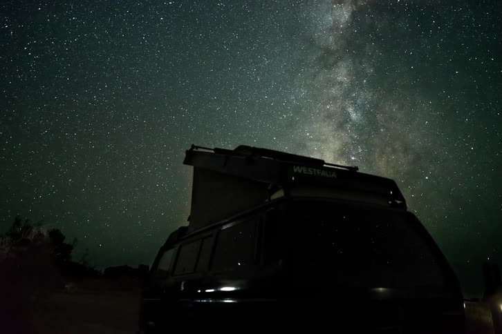 Time lapse of a van with the sky rotating