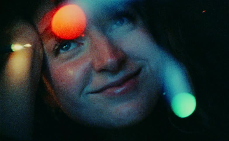 A woman looking at christmas lights