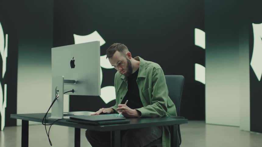 A man designing at a comptuer