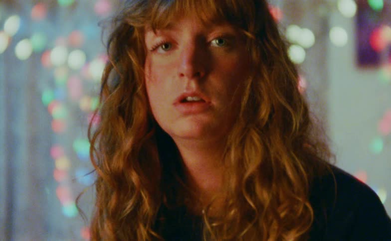 A portrait of a woman in a room