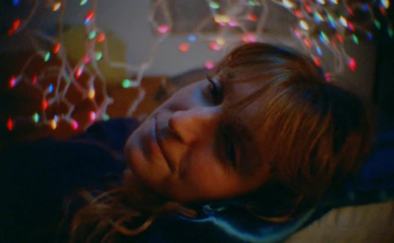 A portrait of a woman indoors