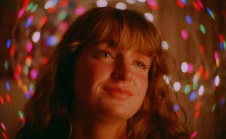 Young woman with multiple facial expressions in an environment with faded colors