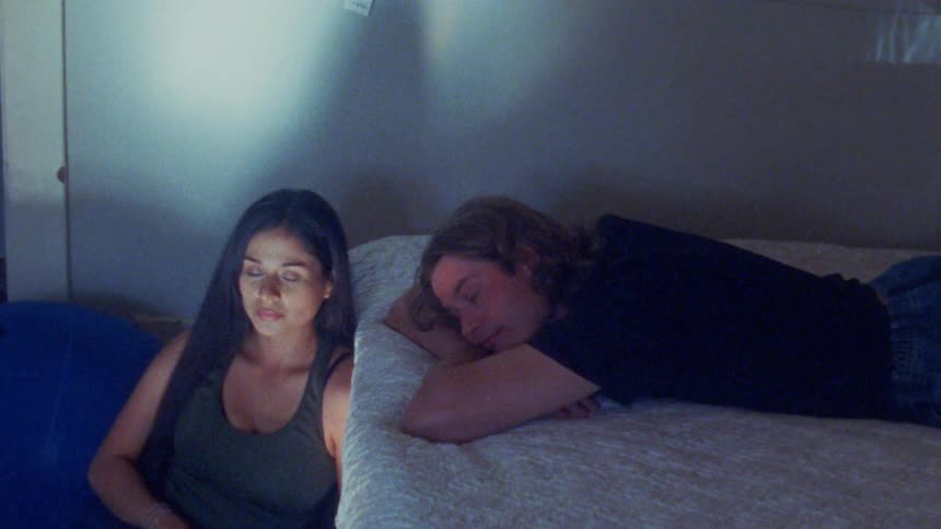 A man and woman in a room together