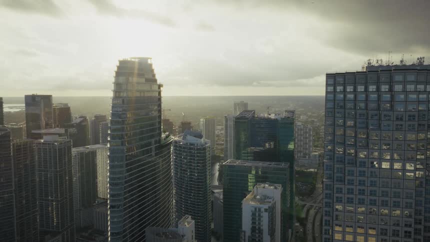 An aerial view of Downtown Miami skyscrapers at sunset
