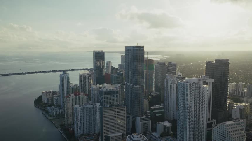 Aerial view of Towers and skyscrapers along waterfront of Downtown Miami