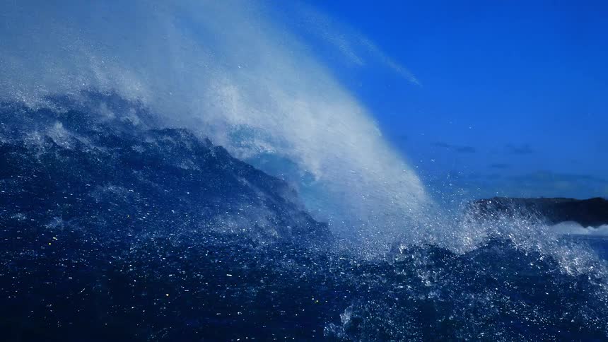 Landscape of a powerful wave breaking on the blue ocean