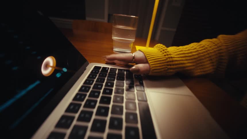 A woman working on a laptop