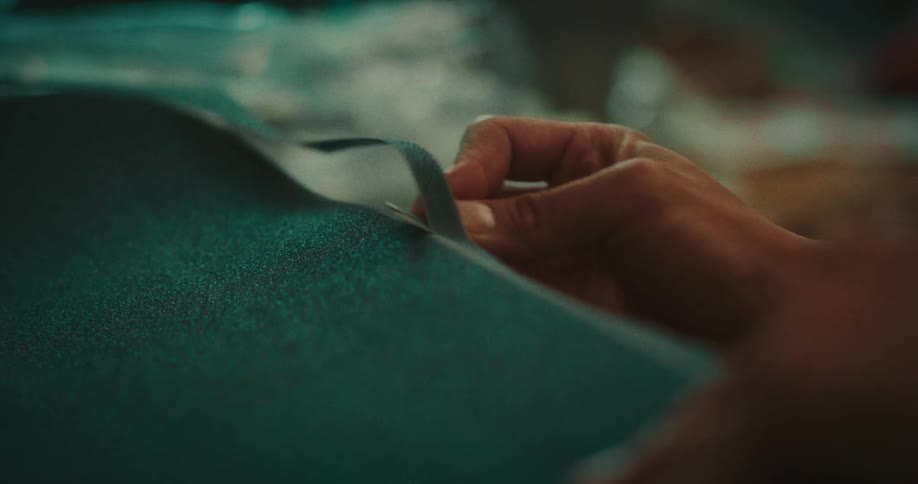 A person working on some fabric design
