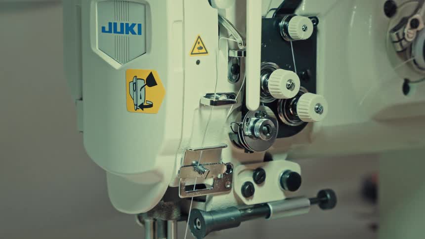 A sewing machine working