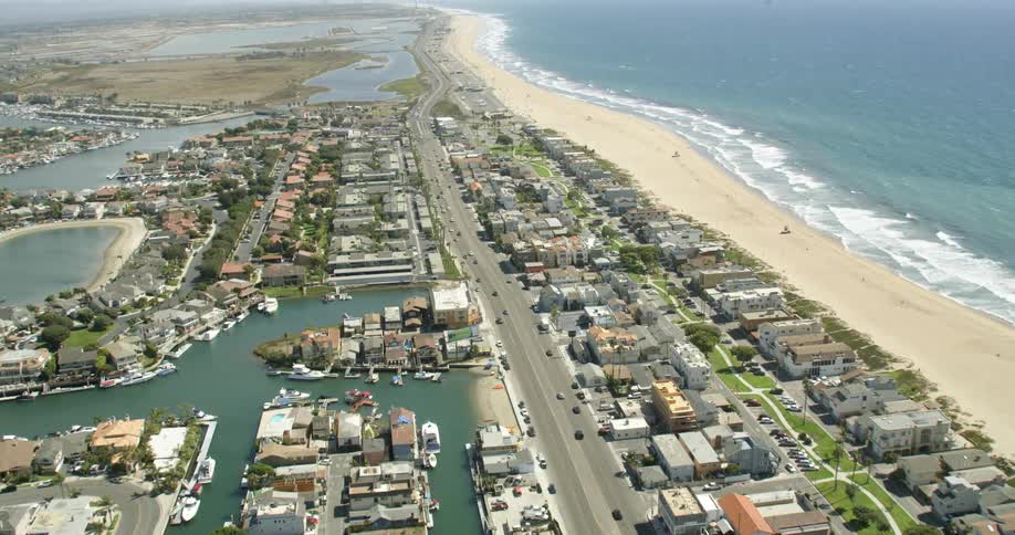 Aerial view of Cars driving on Pacific Coast Highway in Sunset Beach, CA