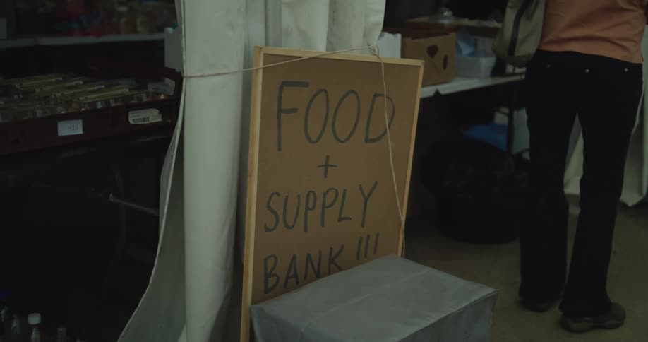 A hand written sign is at the food bank
