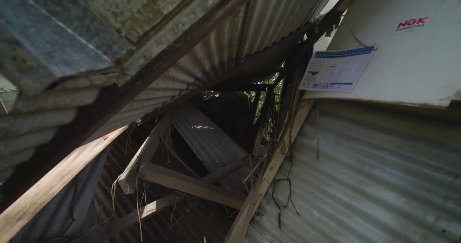 A structure built with zinc covered in ruin
