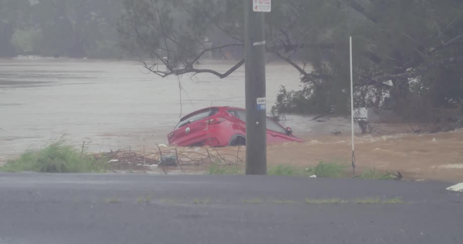 Car floats away on the water during severe flooding