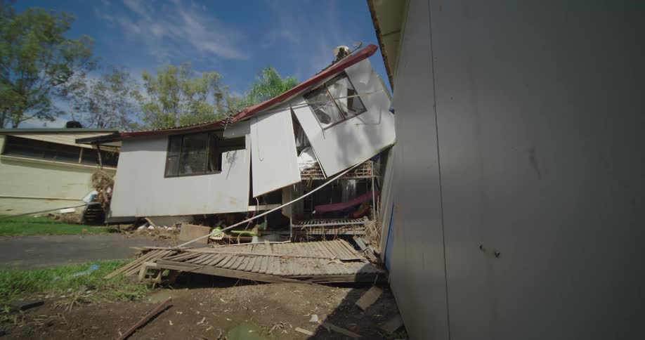 Destroyed house in an urban setting