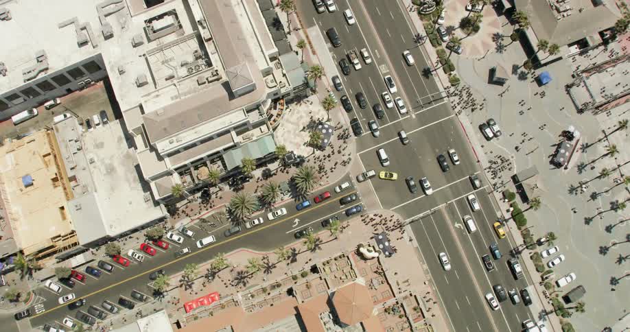 A busy city has many cars on the street below in Huntington Beach, California