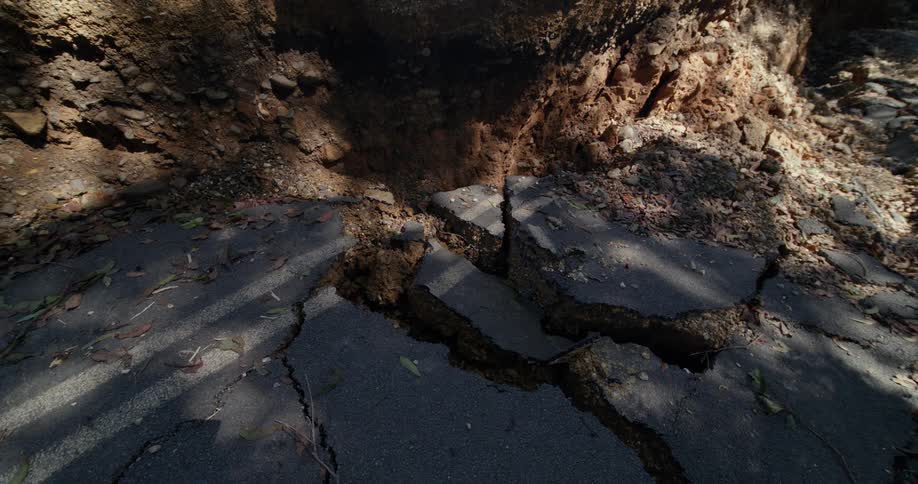 Earthquake damage of asphalt broken up
