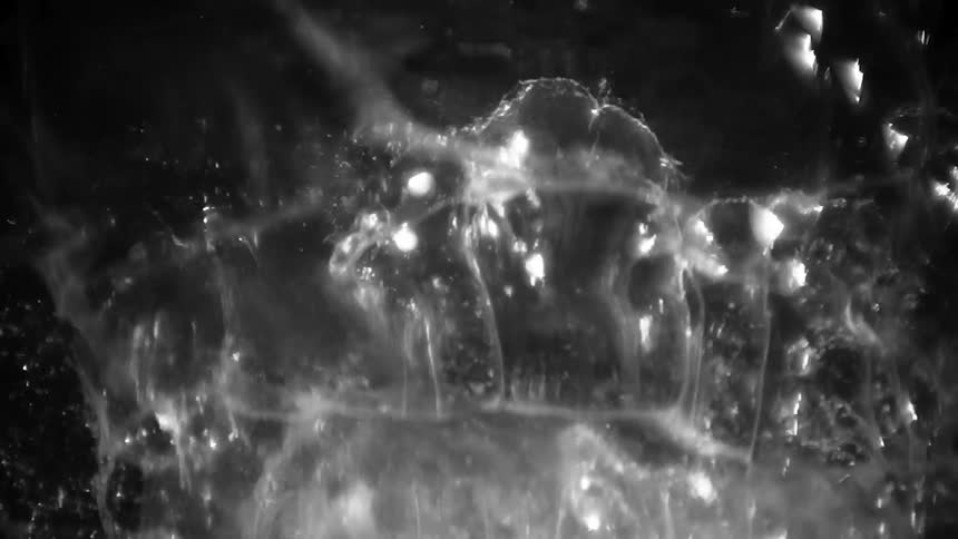 Abstract water in motion against a black background
