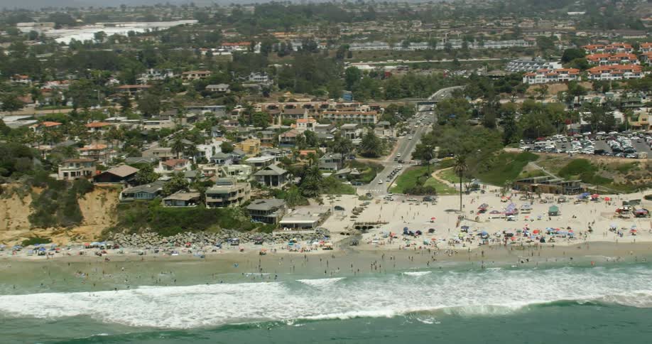 A crowded beach on a sunny day in San Diego, California