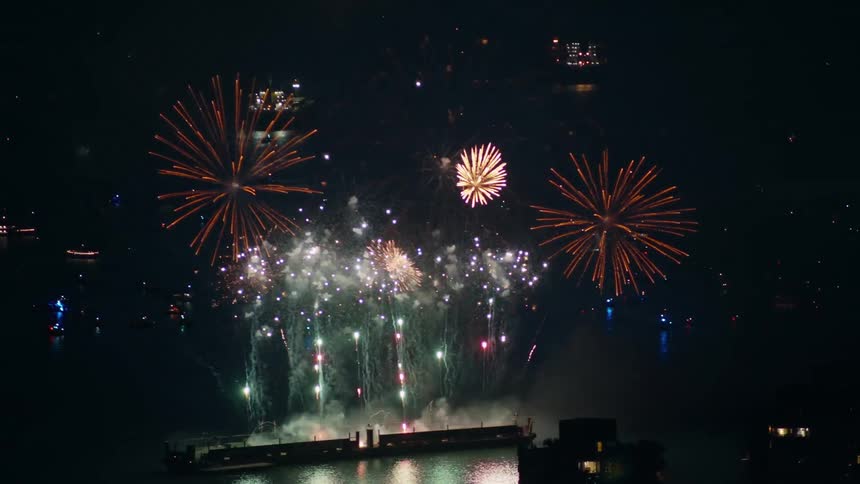 Fireworks being launched from a barge