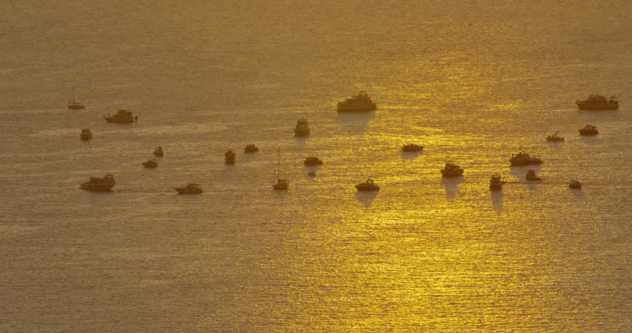 A view of some boats out on water