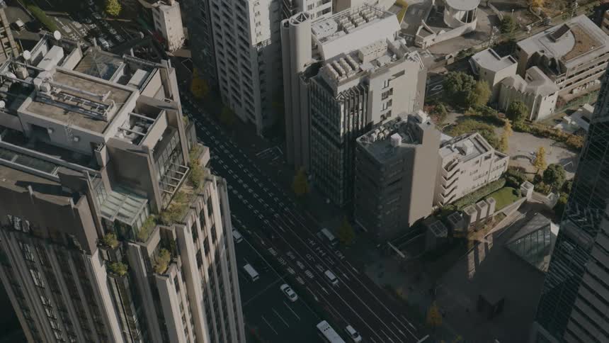 An aerial view of a city with tall buildings