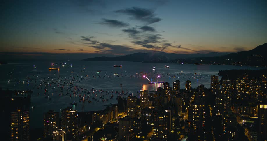 An aerial view of a city full of lights