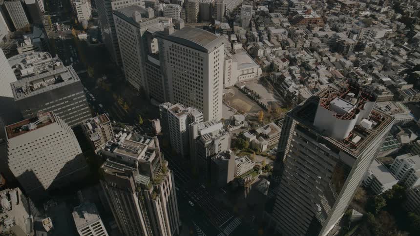 A city filled with highrise buildings and towering skyscrapers at midday