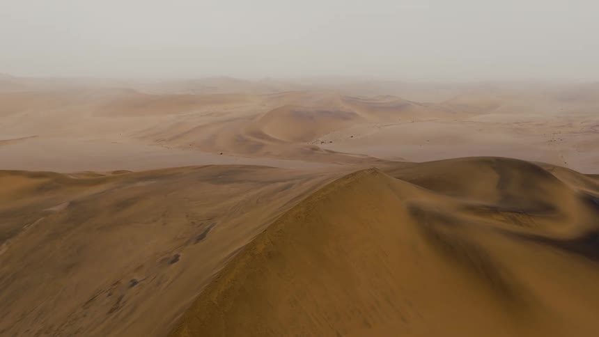Desert area with dunes outdoors during day time