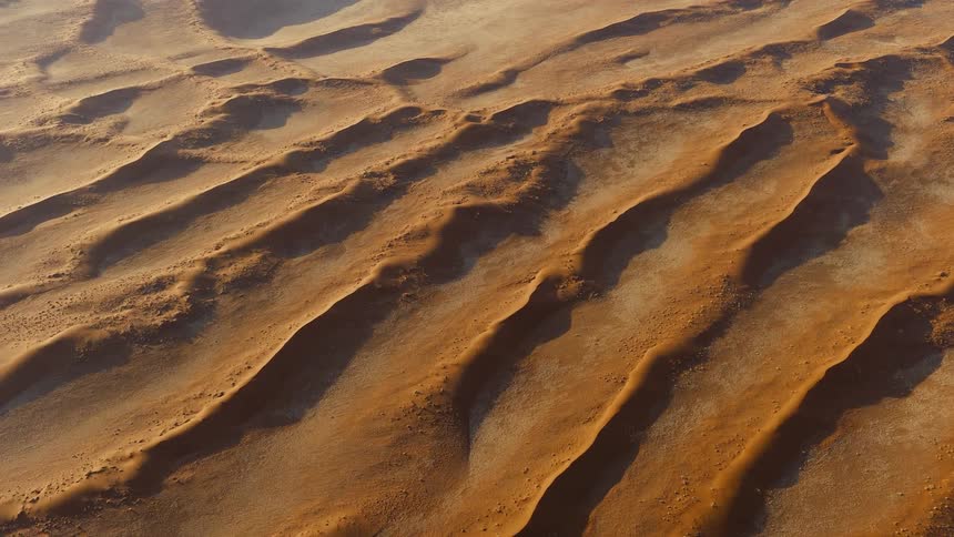 A large desert with sand dunes