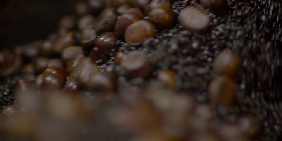Rocks and pebbles swirling in a machine
