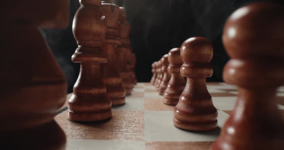 Closeup of chessboards with chess pieces