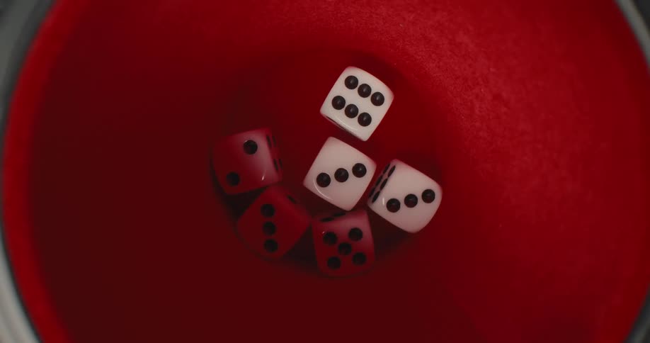 Some dice in a cup for a game