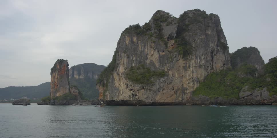 Tall rocks are lining this coast