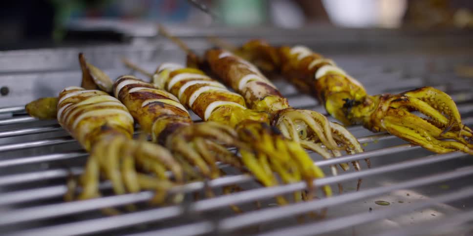 Food is cooking on the grill