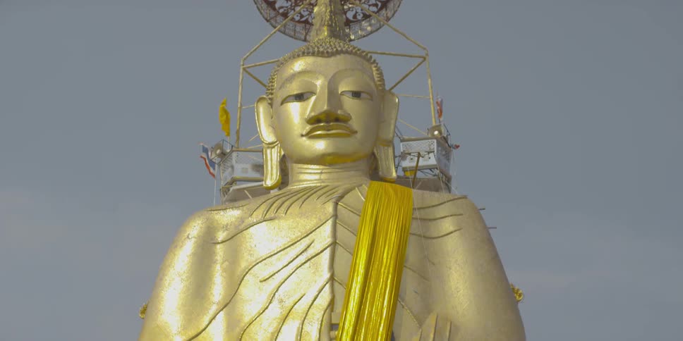 Huge golden statue of ancient man