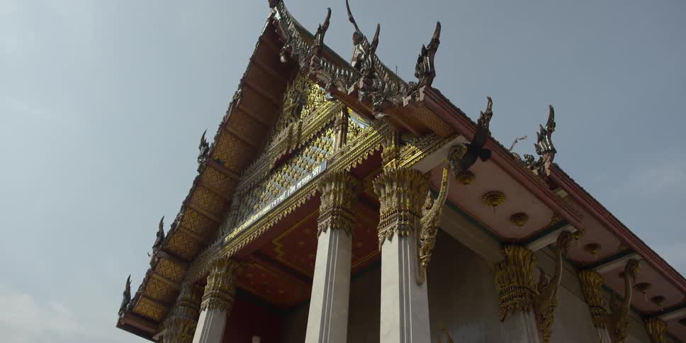 Birds fly around this temple