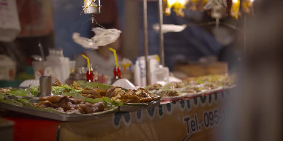 Food is set up on tables for people