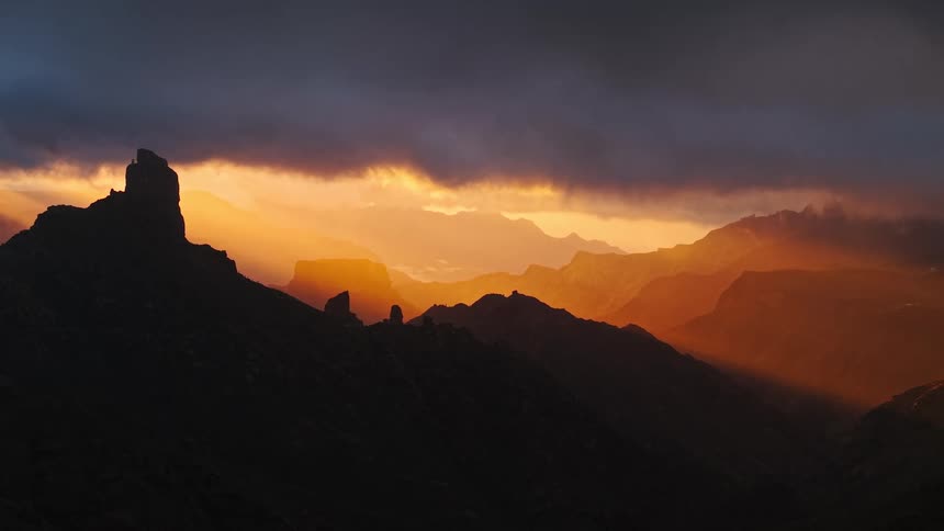 A view of a storm over a mountain