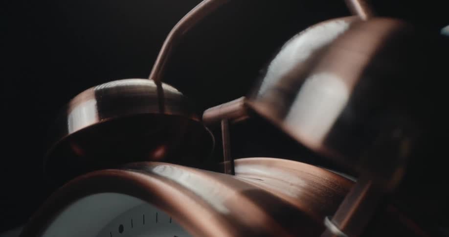An old alarm clock ringing with bells