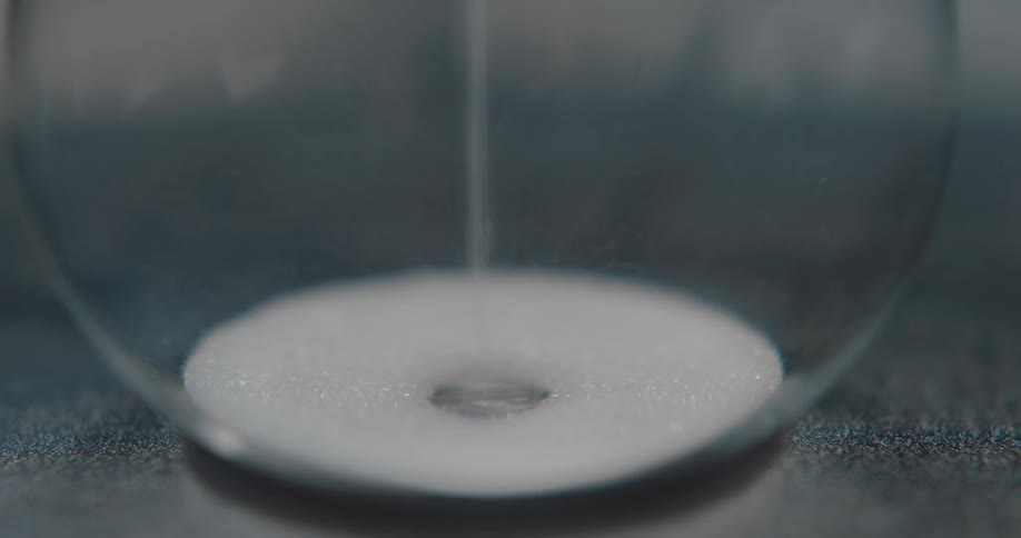 A view of a sand clock hourglass