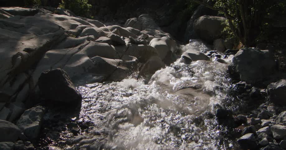 The stream is flowing over the rocks