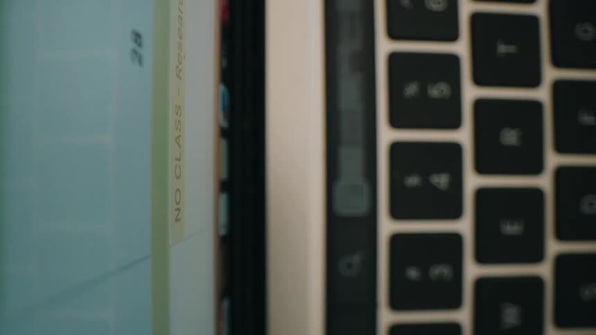 Laptop screen and keyboard displaying a document
