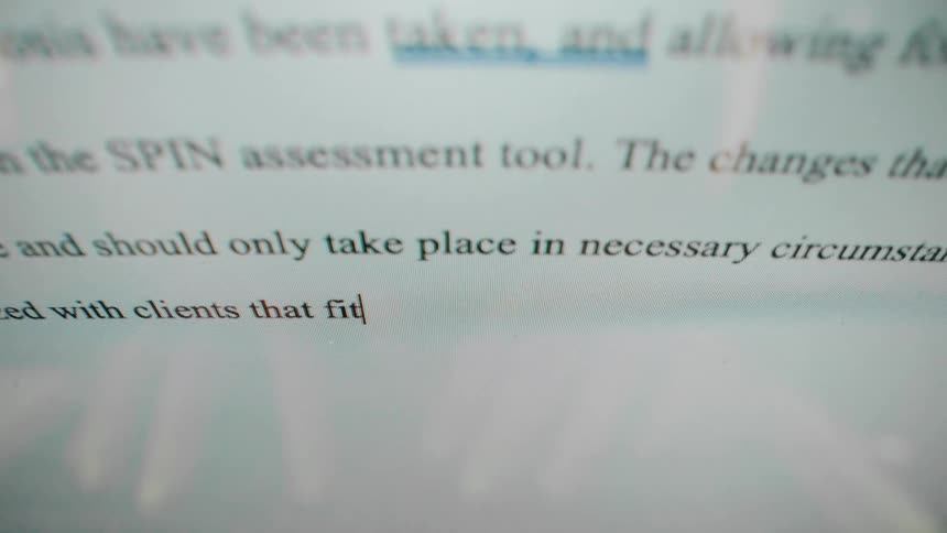 Professional text displayed on computer screen
