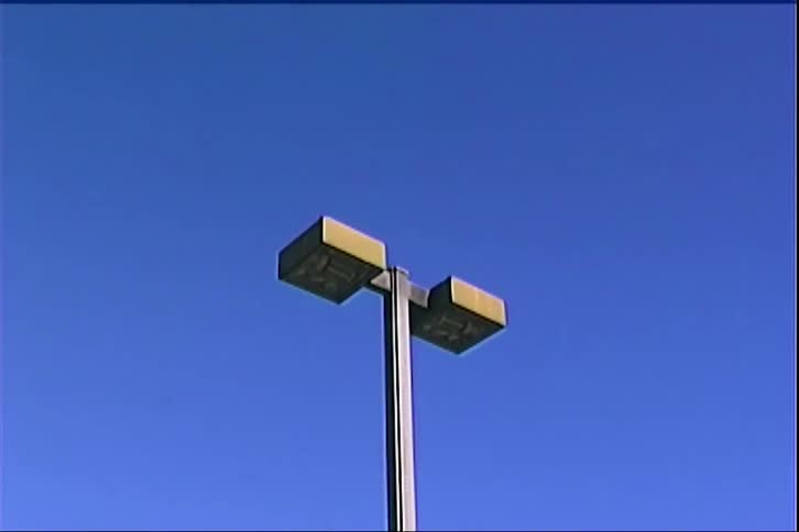 The plane flies through the clear sky