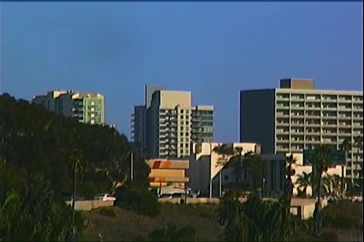 City buildings against a blue sky