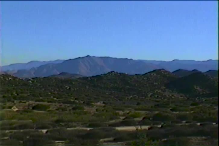 Flat land leads to the mountain range