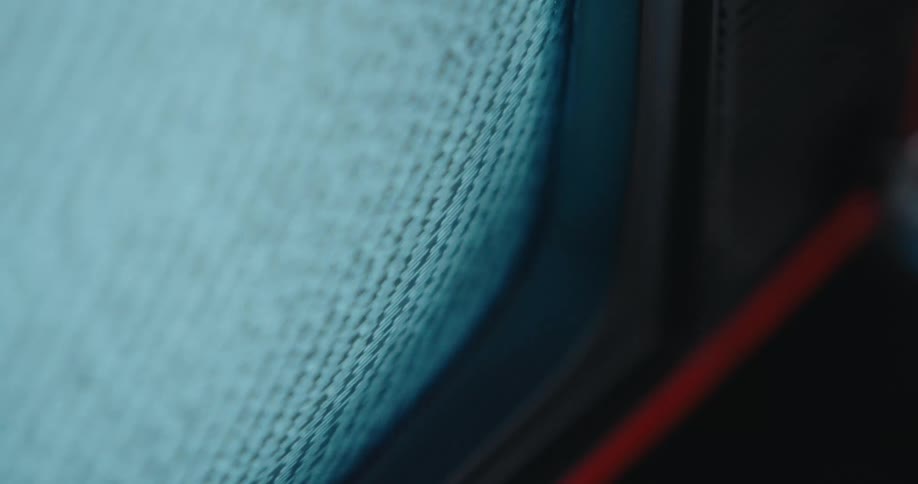 A close up of an old tv screen with static