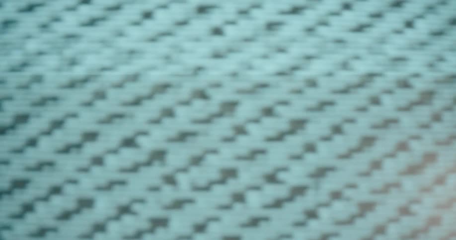Signal noise covers the screen of a red television