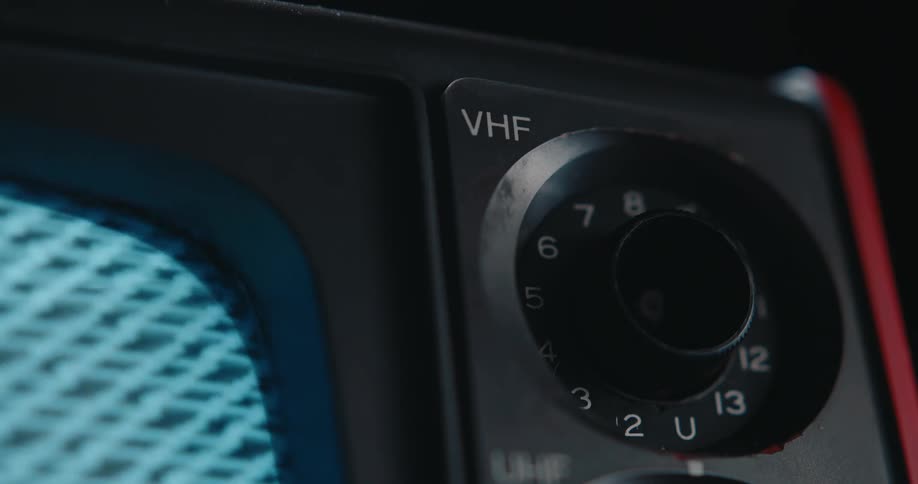 A close up of a vintage tv dial