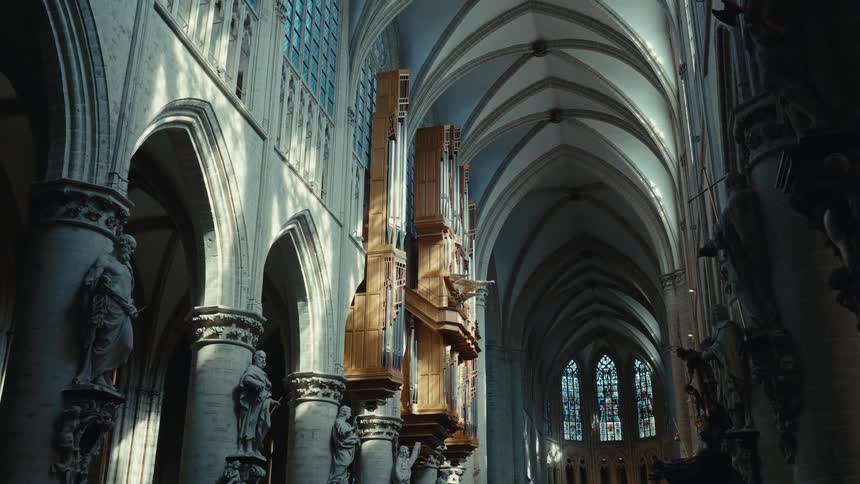 Statues line the walls of a church
